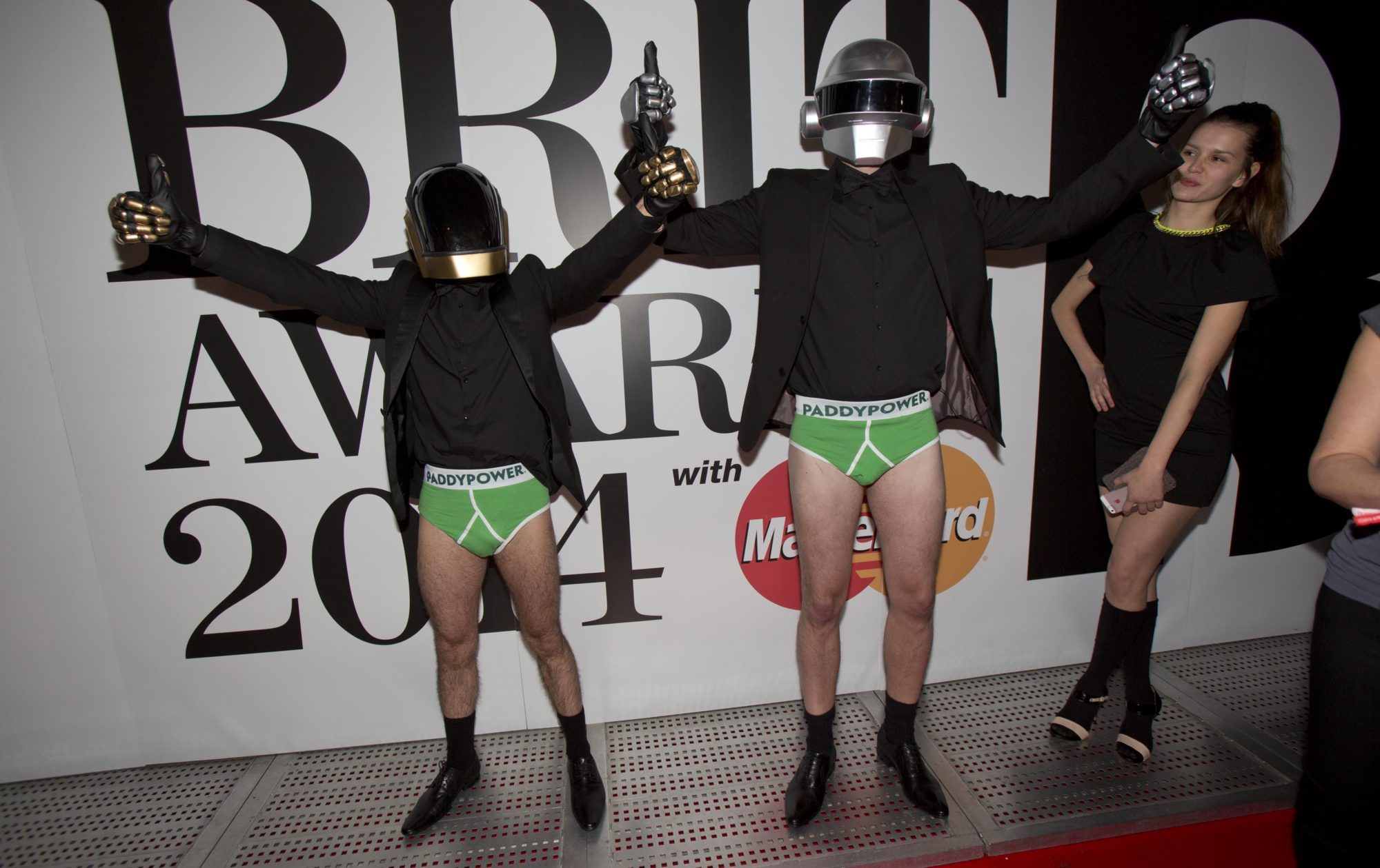 Bookmakers Paddy Power caused a sensation on the Brit Awards red carpet tonight with their very own Daft Punk lookalikes who, after mingling with pop royalty , surprised onlookers by whipping off their trousers Chippendale style to reveal a fetching pair of Paddy Power’s world famous Lucky Pants. 19.2.14 Pix.Tim Anderson